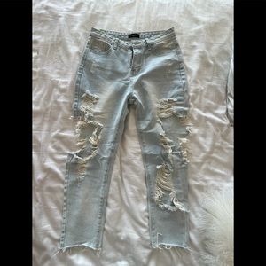Super distressed, light wash boyfriend jean